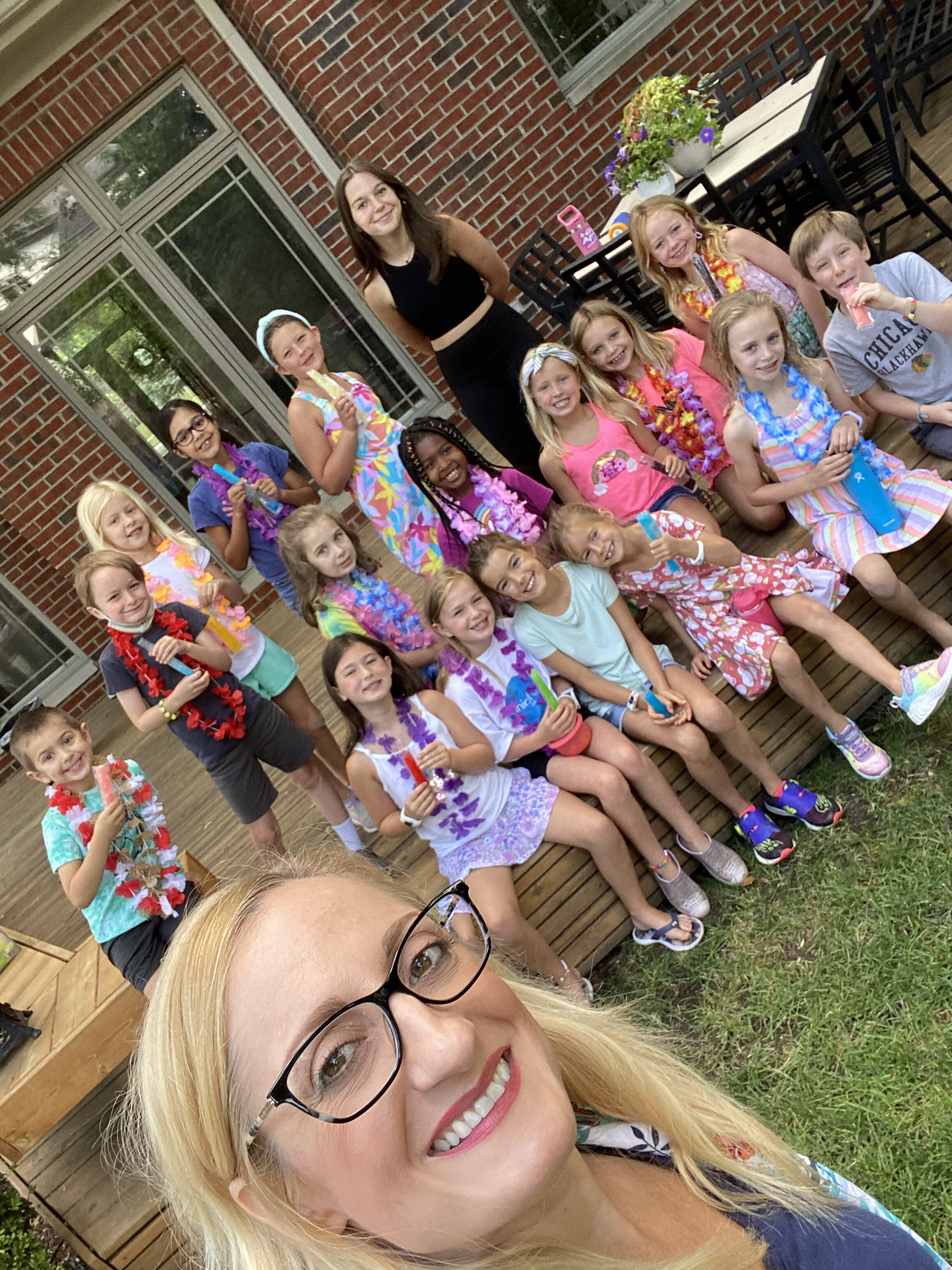 Molly selfie with camp group on the deck